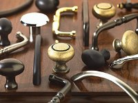 A picture of different types of cabinet hardware that can be used by Cabinet Innovations.