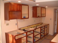 A custom designed and built kitchen being installed by Cabinet Innovations.