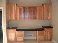 A custom built office desk and bookcases by Cabinet Innovations.